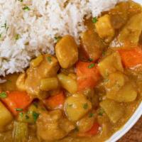 Curry Chicken · Your choice of White Rice, Yellow Rice  
