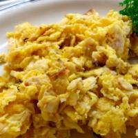 Matzo Brie Breakfast Special · Blend of matzo and eggs get it plain, sweet (with syrup) or savory (with sauteed onions).
