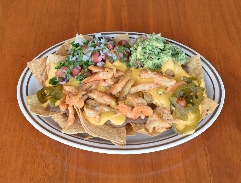 Emily's Nachos · Chips topped with refried beans, melted nacho cheese, pico de gallo salad, guacamole and choice of beef, pork, steak or chicken.