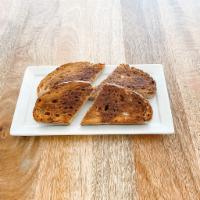 Brulee Cinnamon Toast · Toasted Levan, butter, and torched cinnamon + sugar. Delish! 