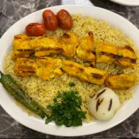 Chicken Kebab Platter · 2 skewers of marinated white meat chicken served with rice and a choice of soup or house sal...