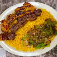 Sultan Platter · 1 beef shish kebab skewer and 1 chicken kebab skewer served with rice and a choice of soup o...