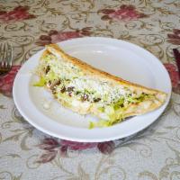 Handmade Quesadilla · Prepared with lettuce and cheese.
