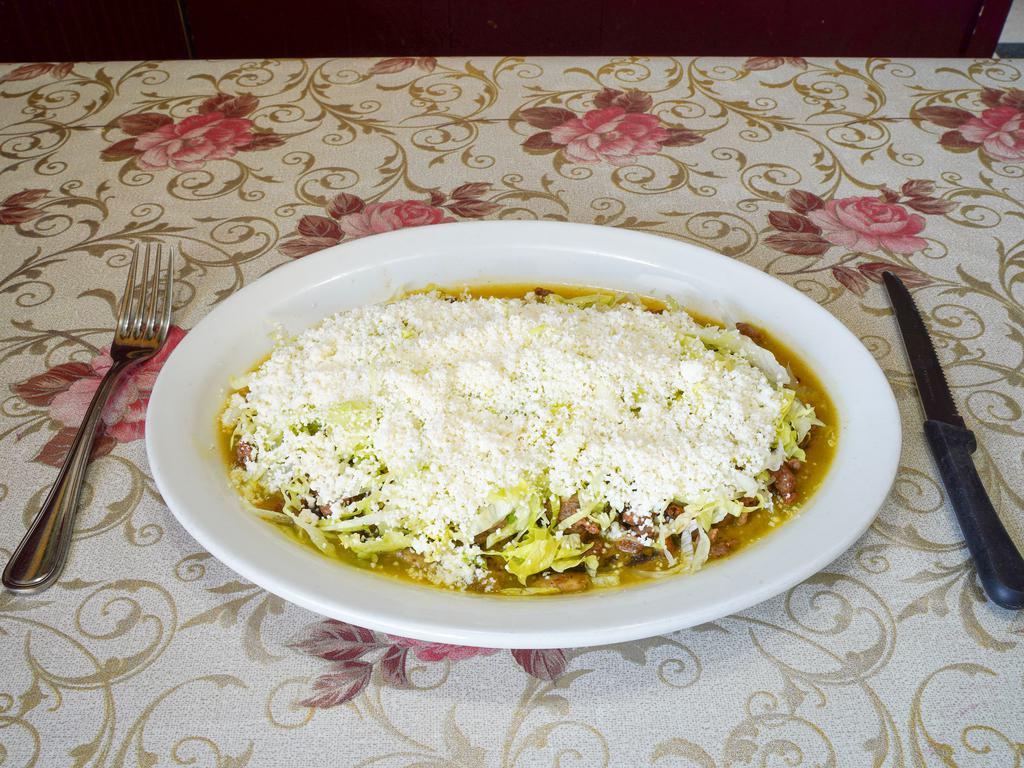 Huarache · Served with choice of meat, salsa verde, lettuce and cheese.