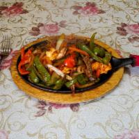 Mix Fajitas · Served with rice, beans and salad.
