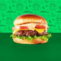 Veg-e-licious Burger · Meatless burger patty, lettuce, tomato, and Veg-e-licious Sauce on a toasted bun