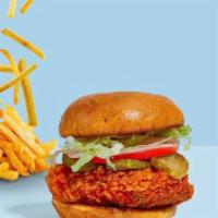 Nashville Hot Ville Sandwich · Crispy fried chicken in Nashville Hot Sauce, coleslaw,  pickles, and spicy mayo wrapped in a...