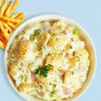 Mashed Down Potatoes · (Vegetarian) Mashed Idaho potatoes cooked, seasoned with garlic, butter, and topped with cri...