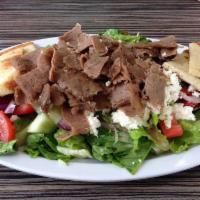 Greek  Salad With Gyro Meat · includes. a mixture of lettuce cucumbers tomatoes onions olives feta cheese  pita bread. gre...