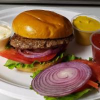 1/3 lb. Burger · served on brioche bun with mayonnaise, lettuce, tomatoes, onions, ketchup, mustard  and pick...