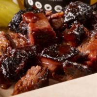 Brisket Burnt Ends · Chopped burnt ends of brisket smoked daily.