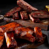Ribs · 6 pieces of Fall off the Bone Ribs with your choice of flavor.