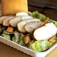 Chicken Caesar Salad · Cool and crisp romaine lettuce with zesty Caesar dressing, shredded parmesan and toasted cro...