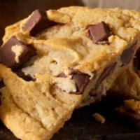 Chocolate Chunk Cookie · Milk chocolate chunks in a giant golden brown cookie.