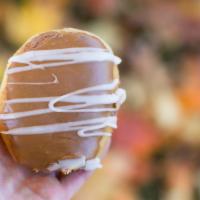 Caramel Apple · Homemade apple filling topped with caramel & drizzled with white icing.