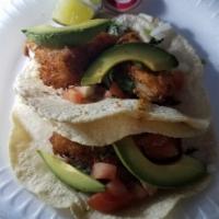 Taco · Street taco made with fresh hand made corn tortillas, your choice of meat and topped with di...