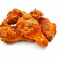 Buffalo Wings · Oven baked spicy wings drenched in Buffalo sauce.