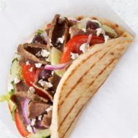 Build Your Own Pita · White or whole wheat pita with your choice of protein, toppings and sauce.