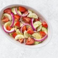 Village Salad · House marinated cucumbers, tomatoes and onions