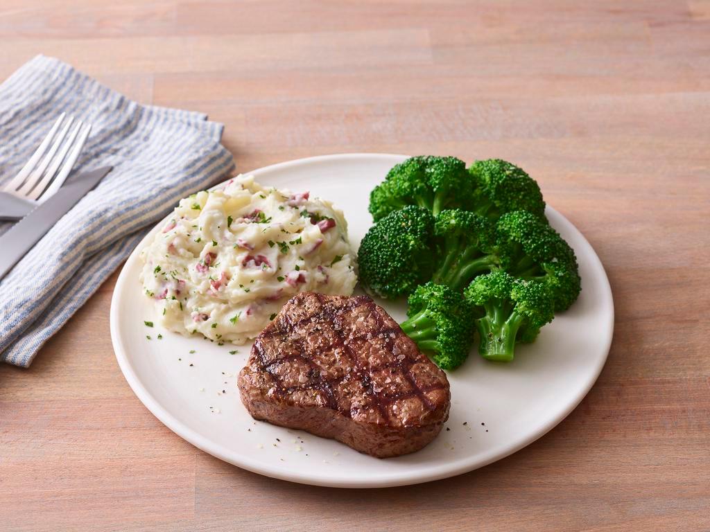 6 oz. Top Sirloin · Lightly seasoned USDA Select top sirloin cooked to perfection and served hot off the grill. Served with mashed potatoes and broccoli. Gluten-sensitive.