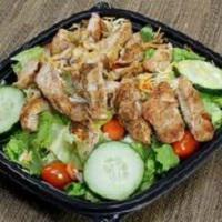Grilled Chicken Salad · white meat chicken served on top of romaine lettuce, cherry tomatoes, cucumbers, carrots and...