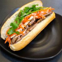 Banh Mi BBQ Pork · Grilled Pork, Mayo, Cilantro, Jalapenos, Cucumber, House Pickled Carrot & Daikon
