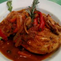 Chicken Cacciatore · 1/2 chicken with tomatoes, sweet peppers, mushrooms, onions and garlic. Please allow 30 minu...
