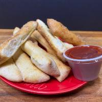 Bubba Bread Sticks · Our signature breadsticks topped with garlic butter and Parmesan. Served with a side of our ...