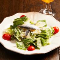 Ensalada De La Casa · Romaine Lettuce tossed in a Garlic Anchovy
Dressing topped with shaved Idiazábal Cheese