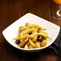 Aceitunas De La Casa Con Guindilla Vasca · Marinated House Olives with Basque Peppers