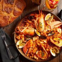 Individual Marinera Con Bogavante · Seafood Paella with Monkfish, Clams, 
Mussels, Squid, Scallops, Shrimp & Lobster