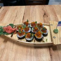 Cruise Ship Roll  · tuna , salmon, hamachi, top ikura, spicy tuna, micro greens 