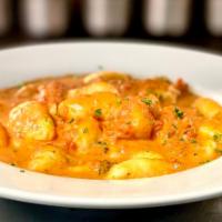 Gnocchi · Dumpling pasta made with potatoes, served with your choice of garlic and oil or red sauce.