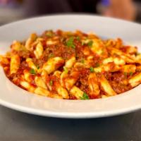 Pasta Con Carne · Your choice of pasta served with meatballs, homemade sausage or bolognese.