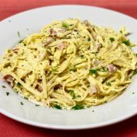 Carbonara  · pancetta, farm fresh eggs, black pepper & grated parmigiano cheese served over your choice o...