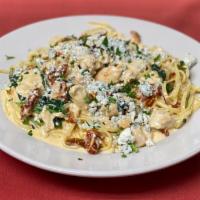 Pollo Gorgonzola · Chicken pieces sauteed with sun-dried tomatoes and baby spinach tossed in a gorgonzola cream...