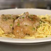 Veal Piccata · Top round veal dredged in flour and pan seared, sauteed with capers, lemon in a white wine s...