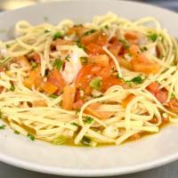 Shrimp Scampi · Succulent large shrimp sauteed with fresh tomatoes, lemon, white wine and a touch of garlic ...