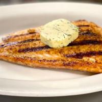 Salmon · Grilled or broiled salmon topped with your choice of dill butter or pesto.