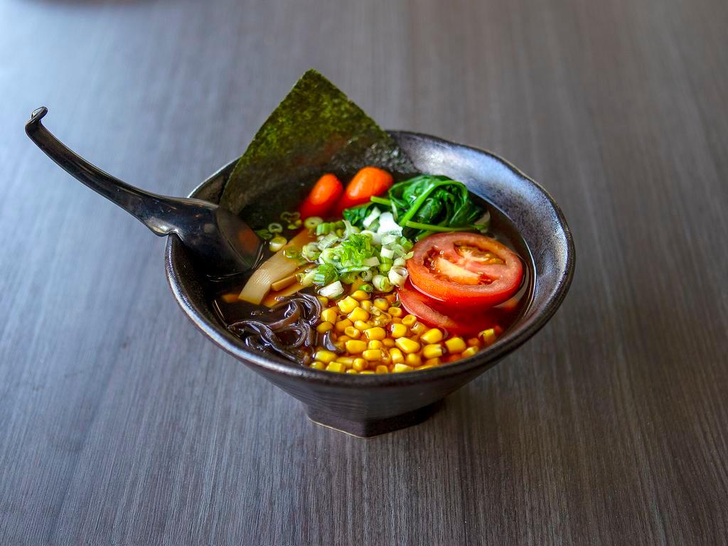 12. Vegetarian Shoyu Ramen · Spinach, carrots, corns, tomato, bamboo shoots, wood-ear mushrooms and green onions in soy sauce based broth (ramen noodle).
