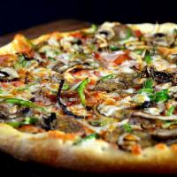 Greek Deluxe Pizza · Feta cheese, gyro meat, extra cheese, tomatoes, green peppers, onions and black olives.