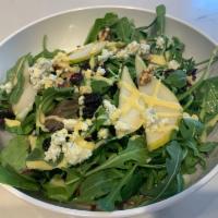 Delicata Salad · Organic Baby Arugula & Spring Mix, fresh Anjou Pears, Crumbled Gorgonzola Cheese, Walnuts, D...