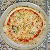 Margherita Pizza · San Marzano tomato sauce, mozzarella cheese, Parmesan, olive oil, and basil.