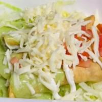  Three Chicken Taquitos · 3 chicken taquitos, with lettuce, guacamole, cheese, sour cream. Served with chips and beans.