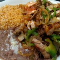 Super Fajitas · Steak, chicken, shrimp mix., Cook with grill bell pepper onions tomatoes serve with rice and...