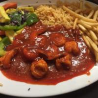 Camarones a la Diabla · Shrimp cooked in a spicy red sauce. Served with rice, veggies and french fries. 