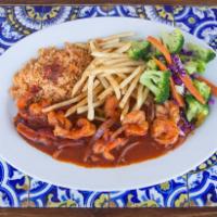 Camarones Rancheros · Shrimp cooked ranchero style. Served with rice, veggies and french fries.