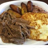Shredded Beef/carne de Res ripiada · It comes with rice and fried plantains salad.