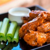 5. Regular Willie’s Baked Wings · Choice of sauce. Never fried!!! Baked, jumbo, herb-marinated wings. Served with celery stick...