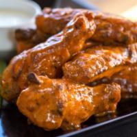5. Large Willie’s Baked Wings · Choice of 2 sauce. Never fried!!! Baked, jumbo, herb-marinated wings. Served with celery sti...
